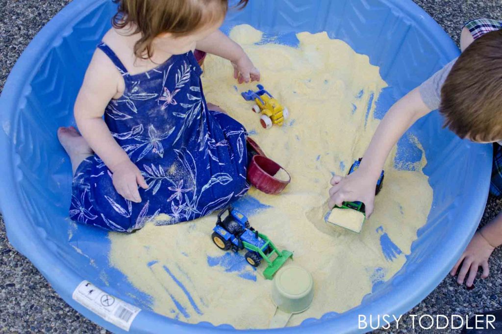 Corn Meal Sensory Pool - Busy Toddler