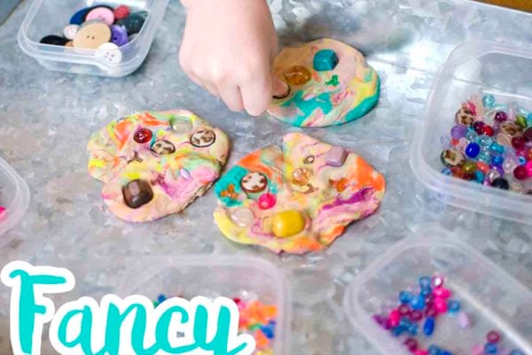 FANCY PLAY DOUGH: Check out this fun activity from Busy Toddler! A great indoor activity using mixed up play dough. Kids will love decorating and making their play dough fancy. A quick and easy toddler activity!