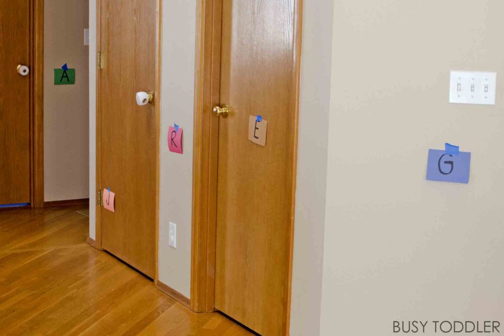 A hallway is covered in construction paper and letter.