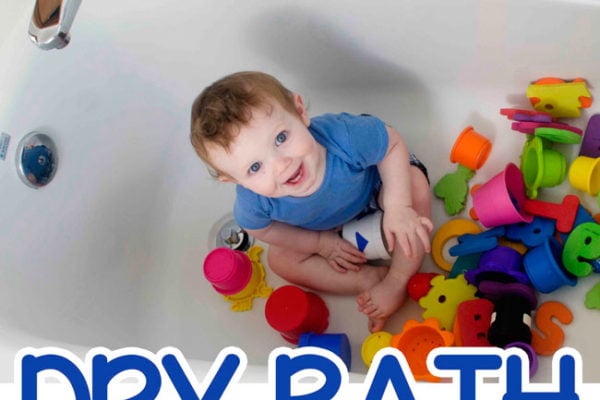 DRY BATH: An easy baby activity that's perfect for the bathroom; babies love this quick and easy activity; an easy way to entertain a baby from Busy Toddler