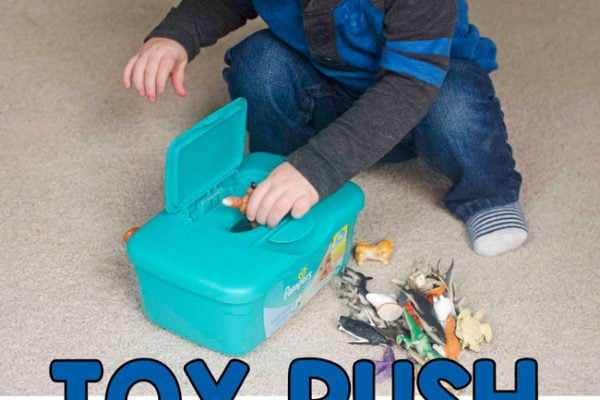 SIMPLE TOY PUSH ACTIVITY: Check out this quick and easy baby activity; a quick and easy toddler activity; easy indoor activity; fine motor skills activity; diy activity; rainy day activity from Busy Toddler