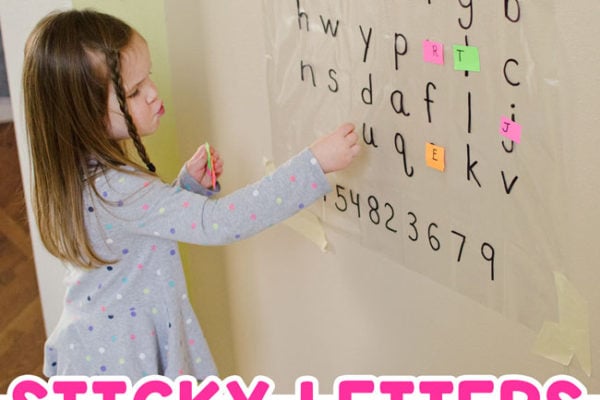 STICKY LETTERS: A quick and easy literacy activity; easy alphabet activity; easy learning activity; preschool abcs; learning the alphabet; learning the abcs with Busy Toddler