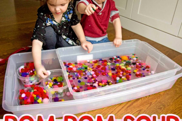 POM POM SOUP SENSORY BIN: A quick and easy toddler activity; preschool activity; easy indoor activity; pom pom balls activity; rainy day activity from Busy Toddler