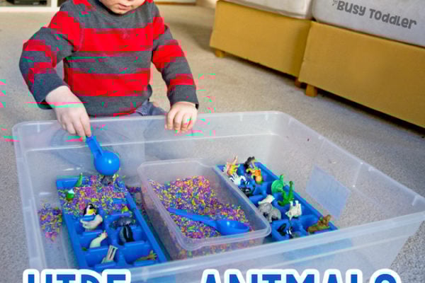 HIDE THE ANIMALS: A quick and easy sensory bin activity; sensory learning for toddlers; toddler activity; quick and easy toddler activity; rainy day activity; rainbow rice activity from Busy Toddler