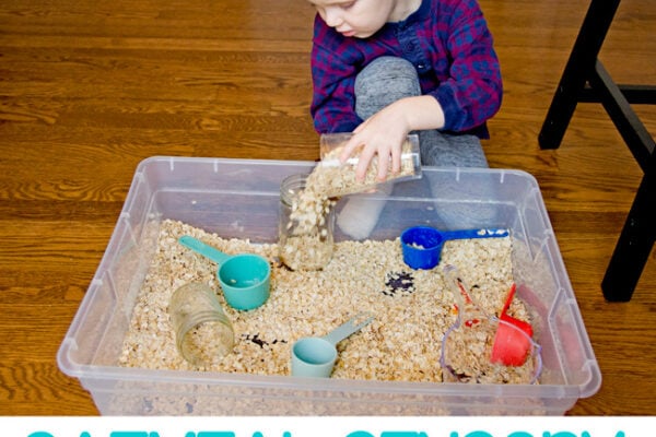 OATMEAL SENSORY BIN - A quick and easy toddler activity using just dry oatmeal. A taste-safe sensory bin for toddlers to play with as a great indoor activity option from Busy Toddler