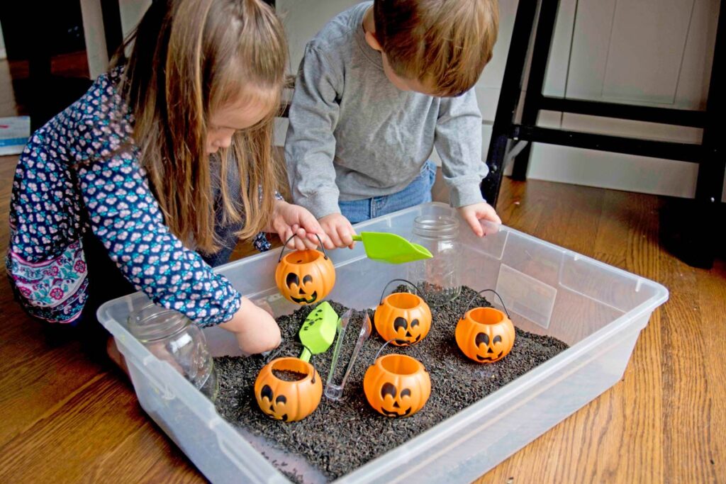 Black Rice Sensory Bin for Halloween Busy Toddler