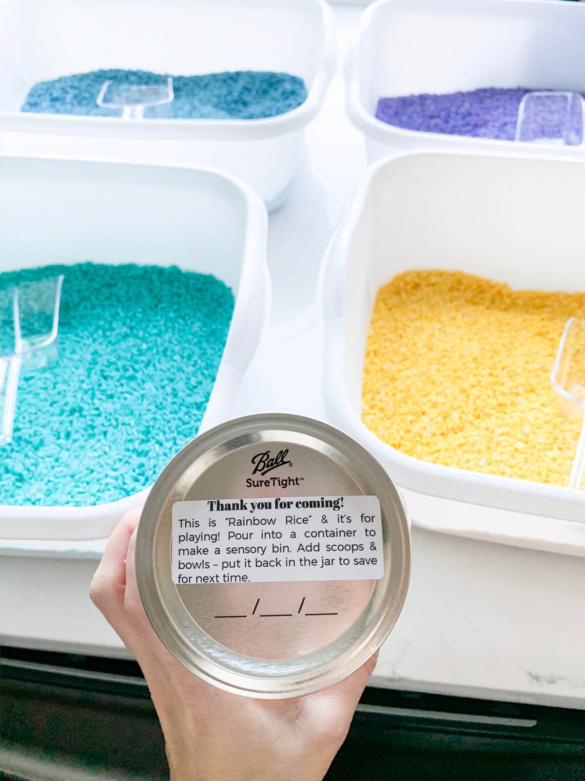 The lid to a jar of rainbow rice explaining what it is.