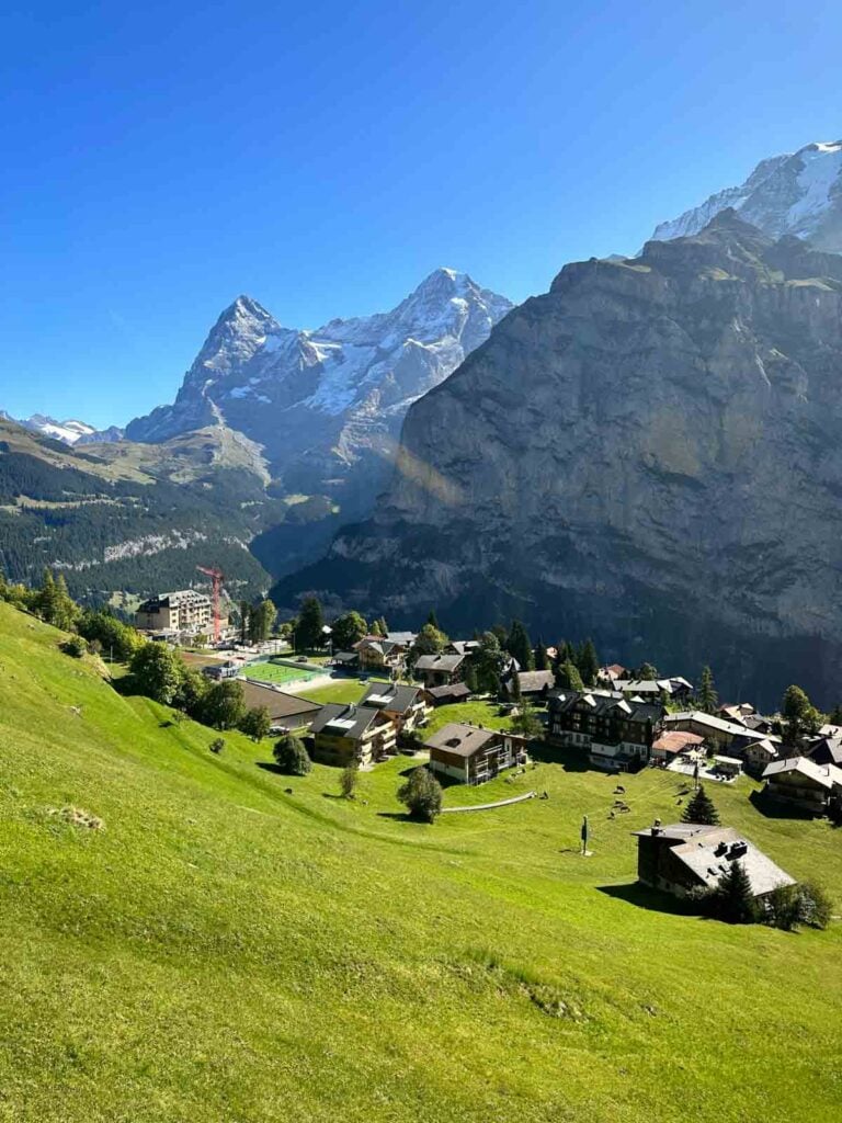 A photo of the town of Murren in the Swiss Alps, taken from a funicular.