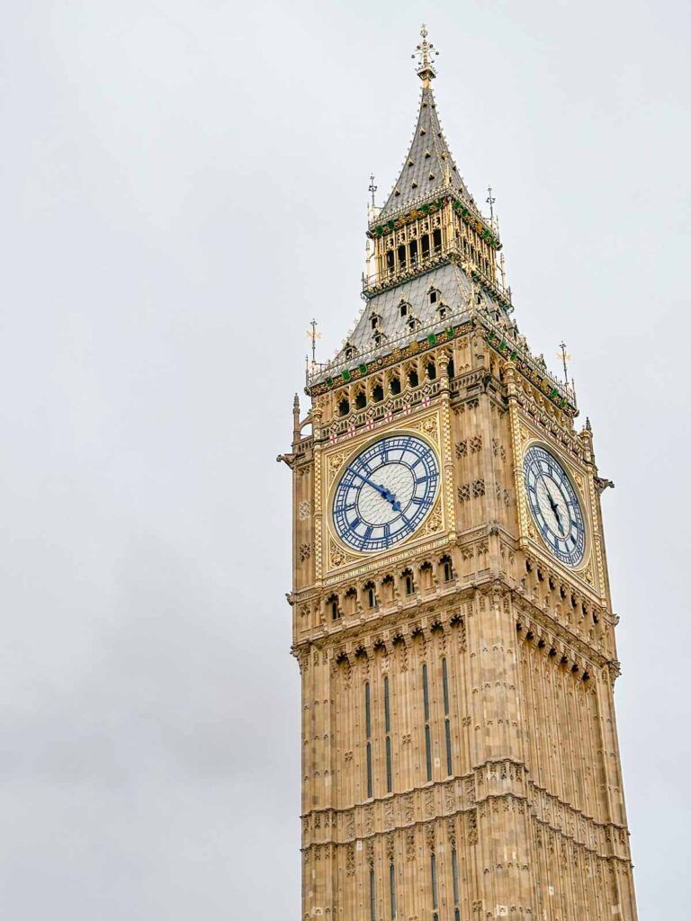 A photo of Big Ben in London against a gray sky,