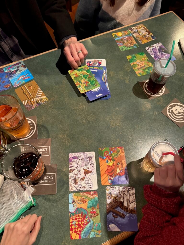 A family plays the game Eye Found It in a restaurant.