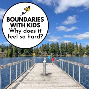Boundaries with kids: why does it feel so hard? Two boys stand on a dock fishing in the sunshine.
